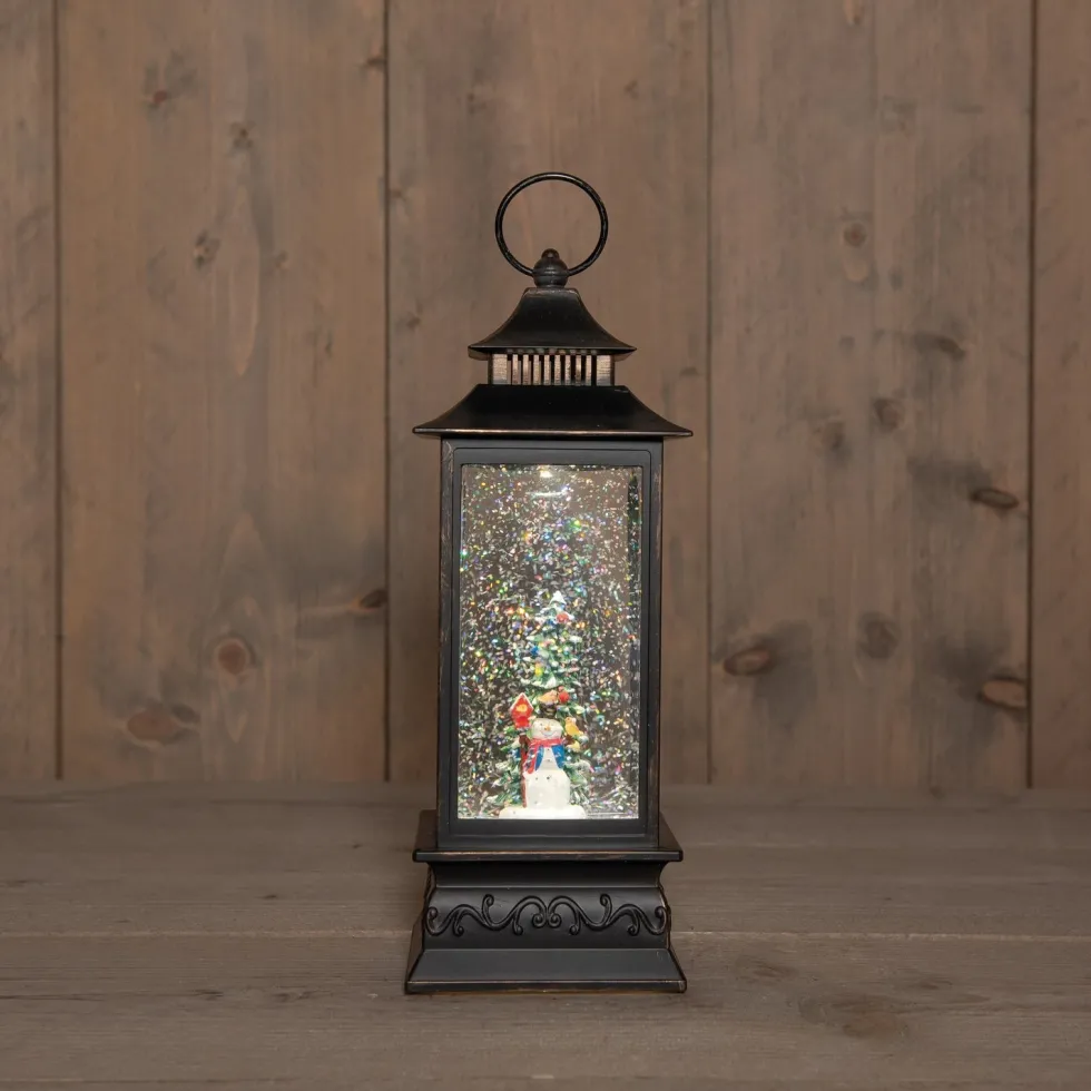 Anna's Collection automatische sneeuwbol lantaarn sneeuwpop zwart met verlichting 15 x 15 x 29 cm