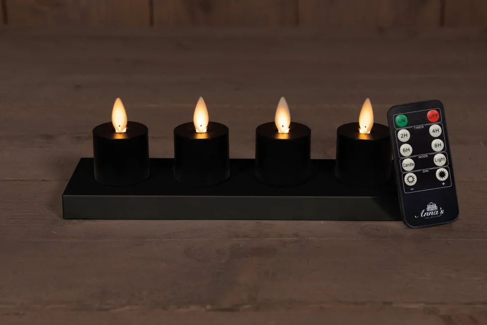 Anna's Collection LED startset waxinelicht met oplaadstation zwart D 3,8 H 6 cm 4 stuks