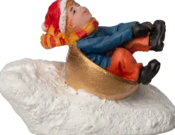 Intratuin kerstdorpminiatuur kind in sneeuwglijder 4 x 2,2 x 3 cm