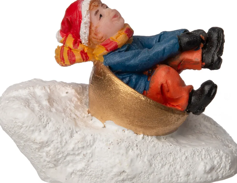 Intratuin kerstdorpminiatuur kind in sneeuwglijder 4 x 2,2 x 3 cm