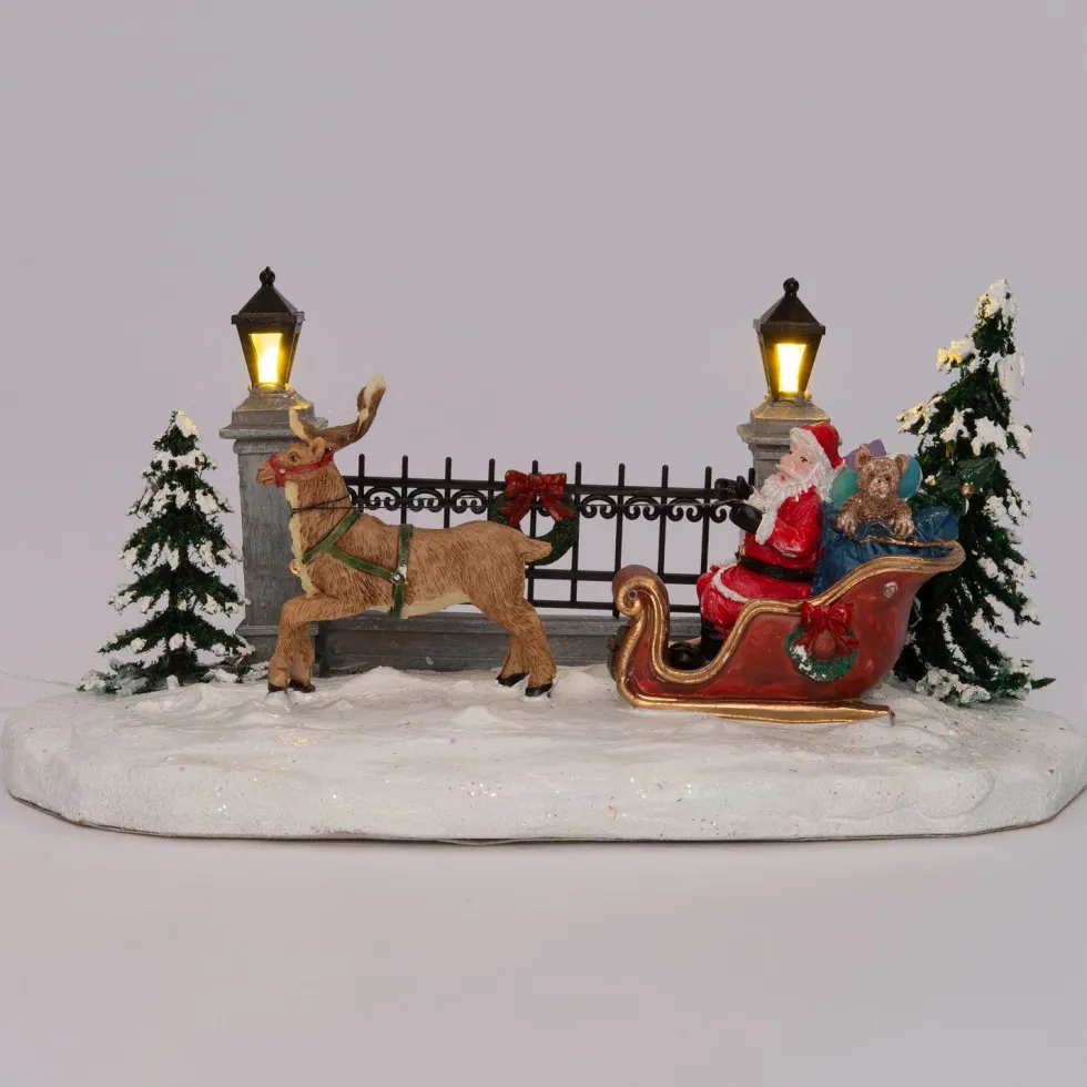 Intratuin kerstdorpminiatuur kerstman in slee 20,5 x 11 x 11 cm