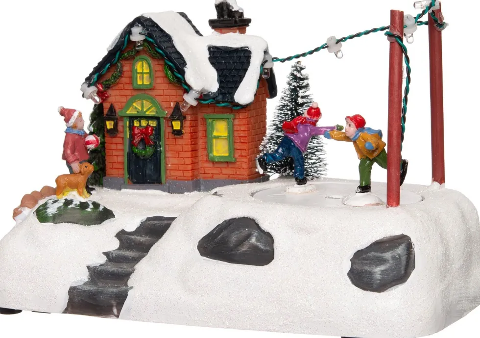 Intratuin kerstdorpminiatuur schaatsende kinderen 18 x 11 x 12 cm