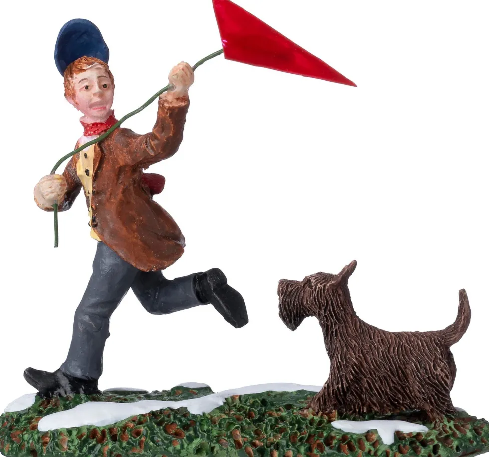 Intratuin kerstdorpminiatuur jongen met vlieger en hond 8,4 x 2,7 x 7,2 cm
