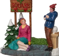Intratuin kerstdorpminiatuur vrouwen bij ingang park multi 10 x 6 x 8,5 cm