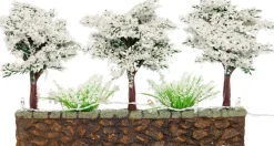Intratuin kerstdorpminiatuur muur met besneeuwde bomen 20 x 7,5 x 11 cm
