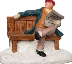 Intratuin kerstdorpminiatuur man met krant op bankje 7 x 4 x 6 cm
