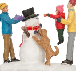 Intratuin kerstdorpminiatuur kind met sneeuwpop 8,5 x 4,5 x 7 cm