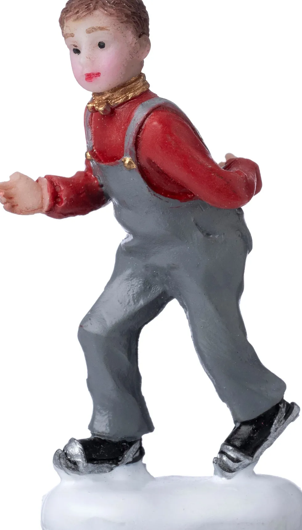 Intratuin kerstdorpminiatuur schaatsende jongen 2,2 x 1,2 x 5 cm