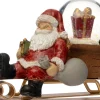 Intratuin sneeuwbol kerstman op slee rood 10,5 x 6 x 8,5 cm
